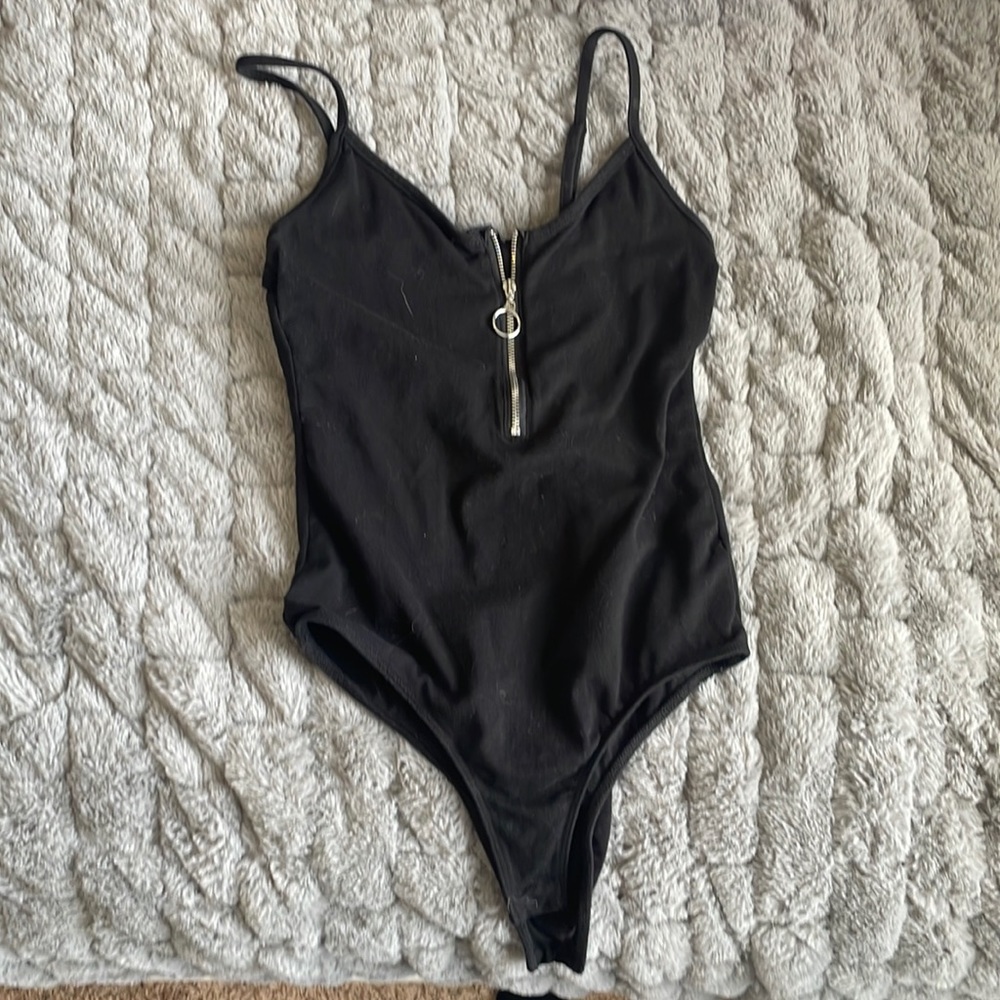 Black bodysuit in side “small” found in the juniors section.